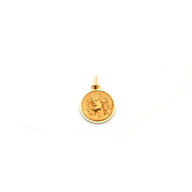 Sam GRUN - Médaille religieuse en or jaune (750) ornée de la tête du Christ, si…