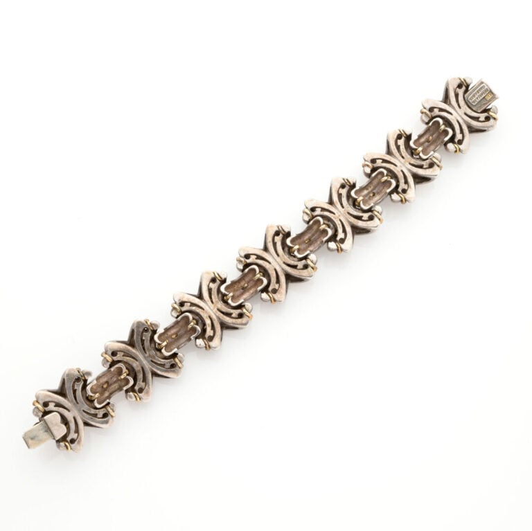 TIFFANY & Co - Bracelet articulé en argent (925‰) partiellement torsadé à motif…