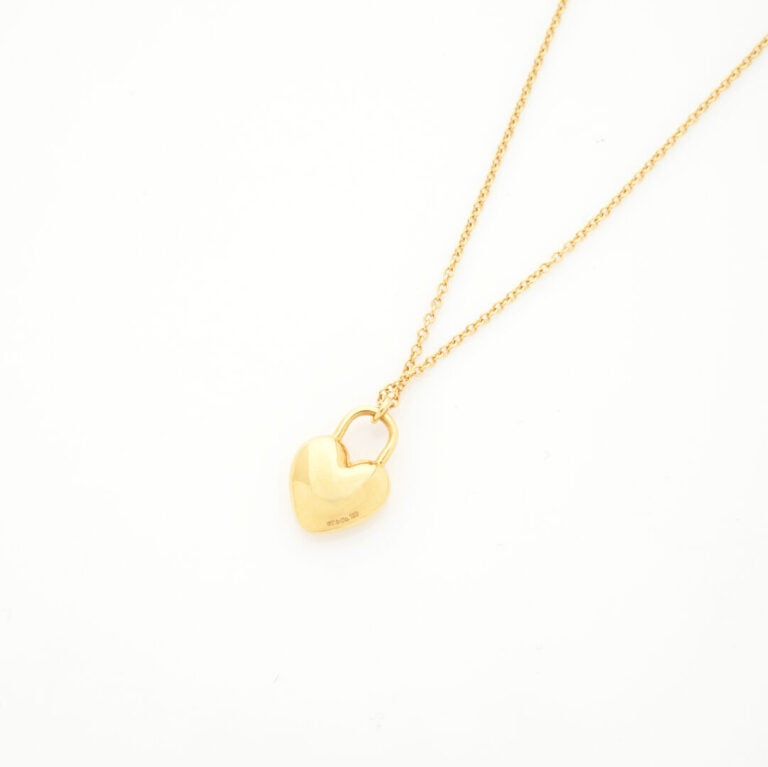 TIFFANY & Co - COLLIER chaînette en or jaune (750‰) retenant un pendentif "cade…