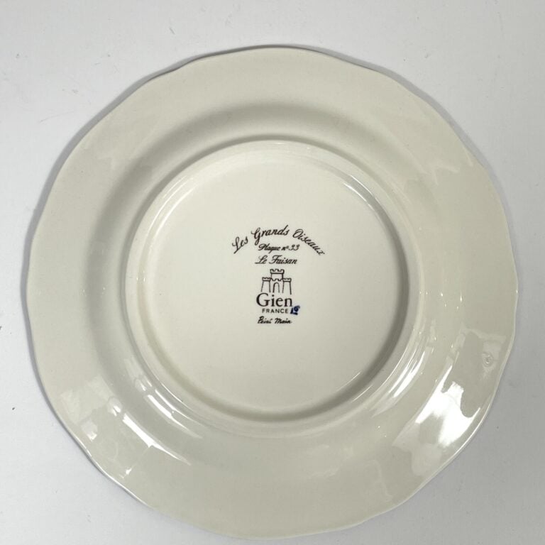 GIEN. "Les grands oiseaux" - Série de 10 assiettes en faïence à décor peint - D…