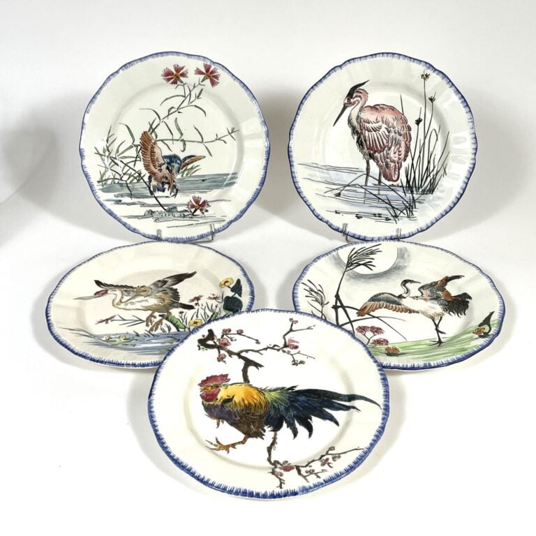 GIEN. "Les grands oiseaux" - Série de 10 assiettes en faïence à décor peint - D…