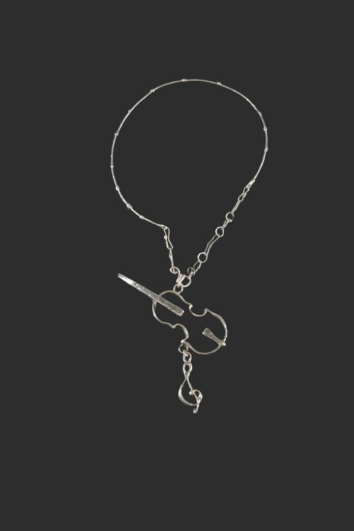 Gilbert LIBLIN (Né 1954) - Collier torque en argent (925) retenant un pendentif…