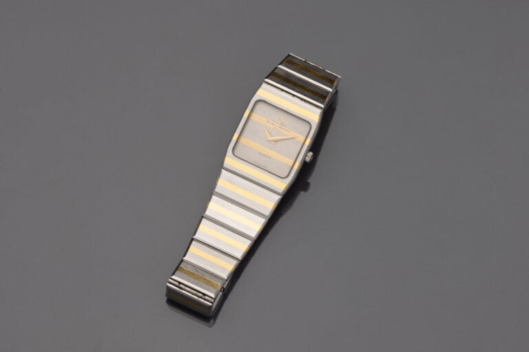 BAUME & MERCIER - BRACELET MONTRE carrée de dame en acier, deux tons, entièreme…