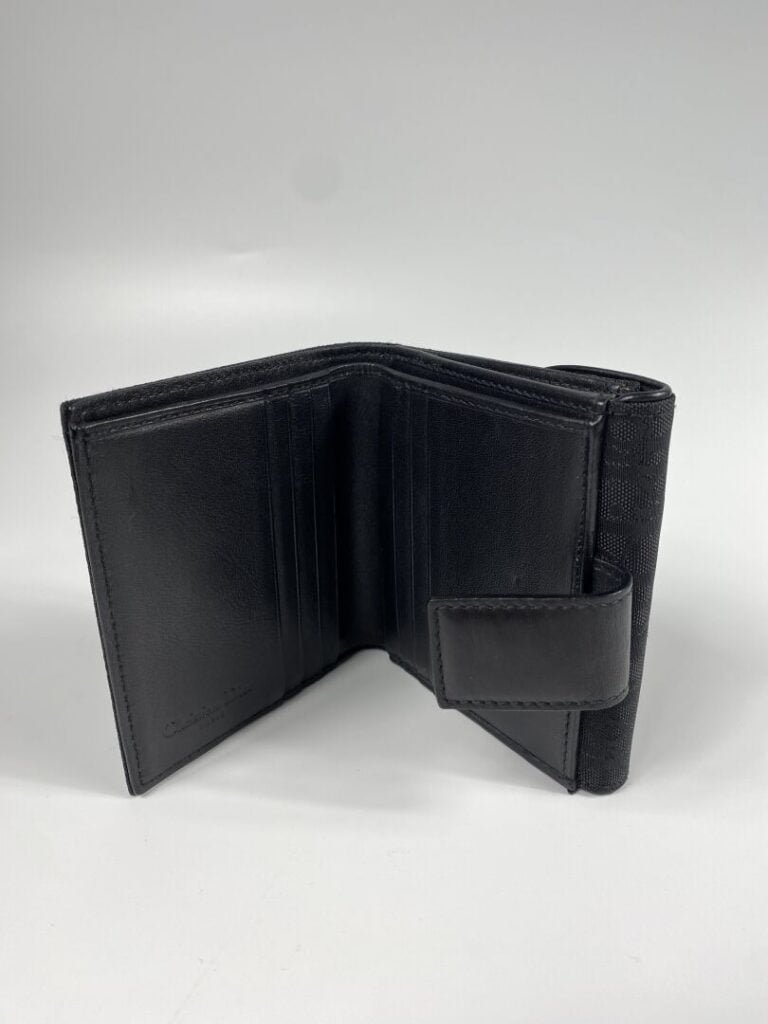 CHRISTIAN DIOR - Portefeuille en cuir et toile oblique noire, orné d'un noeud e…