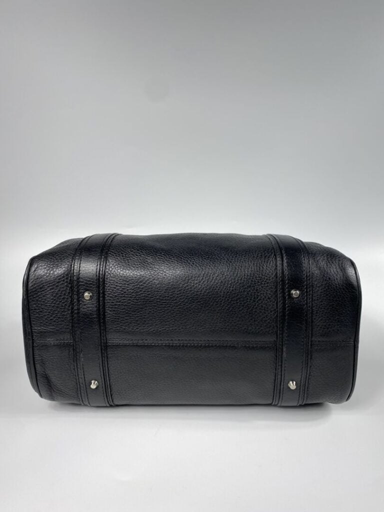 CHRISTIAN DIOR - Sac bowling en cuir grainé noir, double anse, plaque en métal…