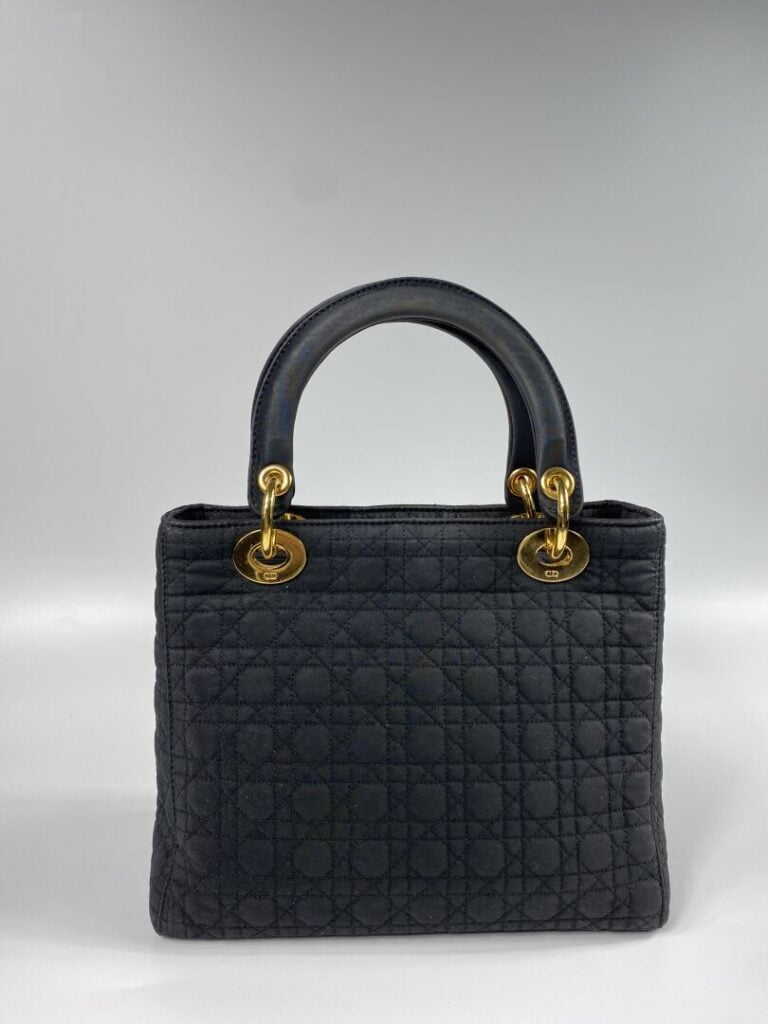 CHRISTIAN DIOR - Sac Lady Dior en toile matelassée Cannage noire, garniture en…