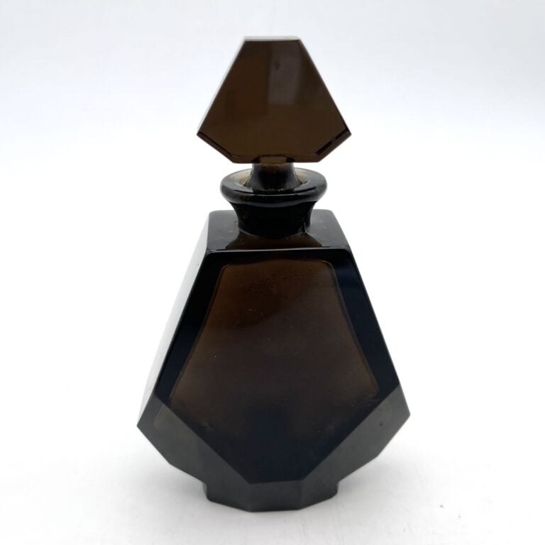 GUERLAIN, "Loin de tout", (1935), 1 flacon en cristal de Baccarat ambré - H. 12…