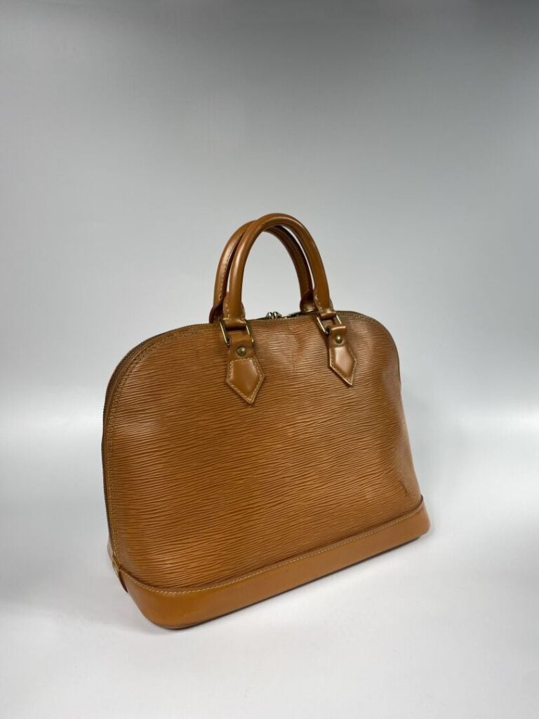 LOUIS VUITTON - Sac « Alma » en cuir épi cognac, double poignée, bijouterie dor…
