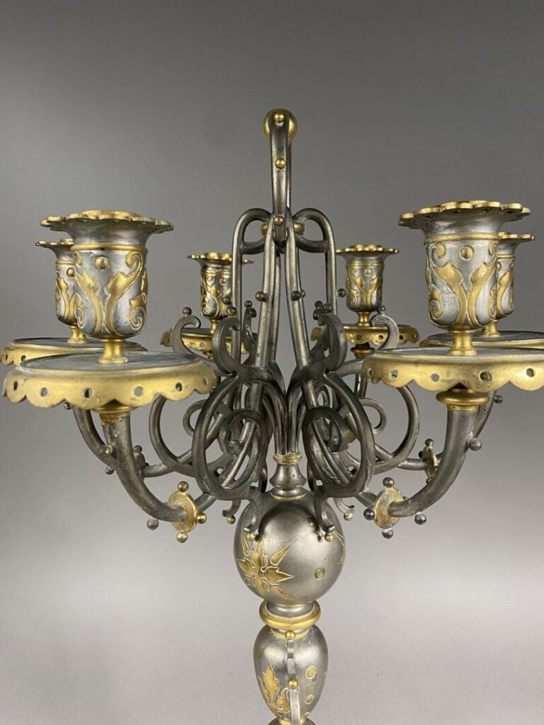 BARBEDIENNE - Candélabre en bronze à deux patines à six bras de lumière à décor…