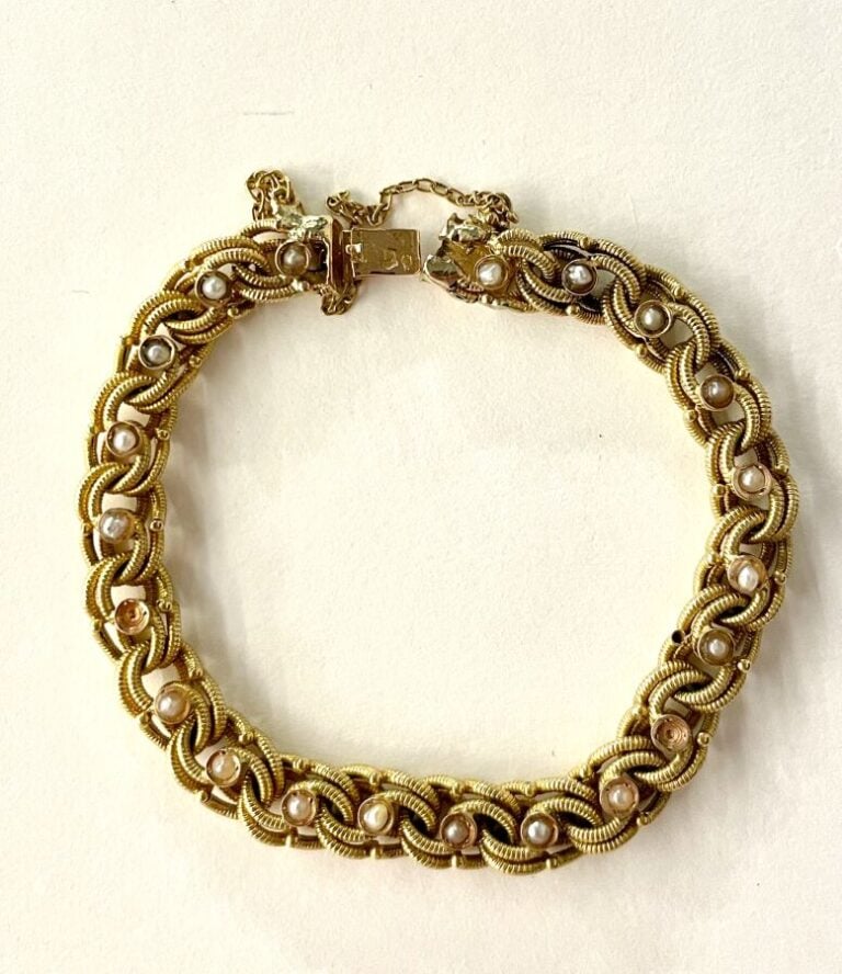 Bracelet en or jaune à maillons torsadés(750 ‰) et perles (manques) - Poids bru…