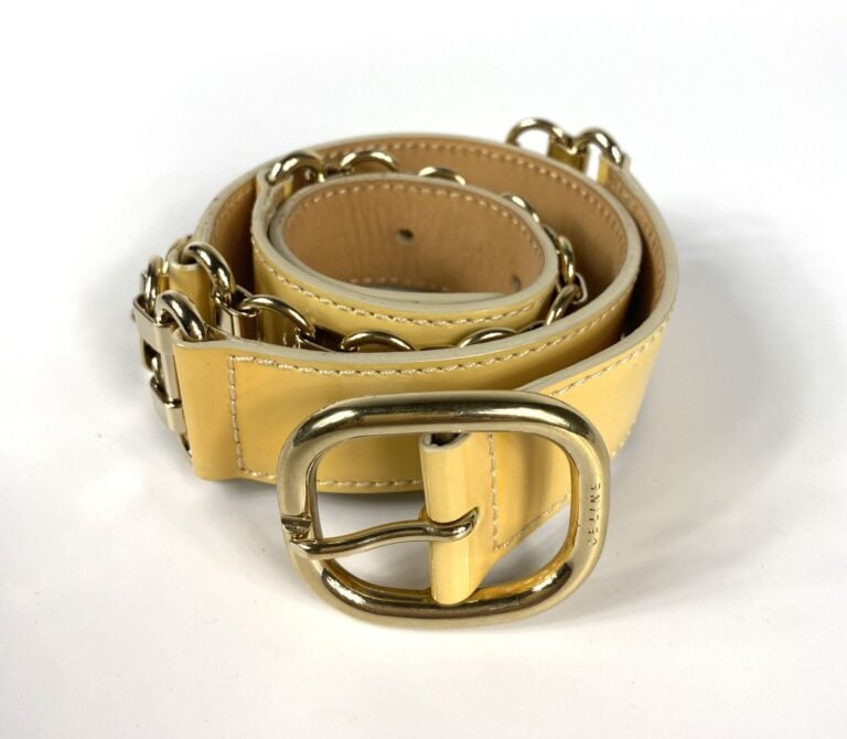 CÉLINE - Ceinture en cuir verni beige entrecoupé de maillons en métal doré (Tai…