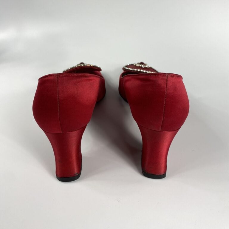 CHARLES JOURDAN, ELIE JAGO - Lot de deux paires d'escarpins à petit talon rouge…