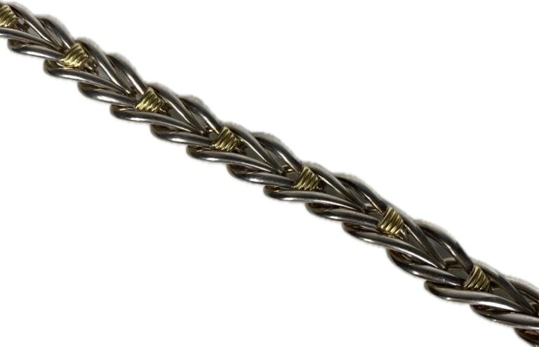 CHRISTOFLE - Bracelet articulé à mailles chevrons en argent entrecoupées de mot…