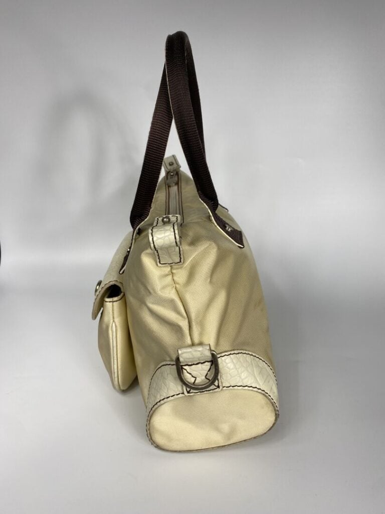 LANCEL - Sac en tissu beige et cuir crème façon reptile, porté main, double ans…