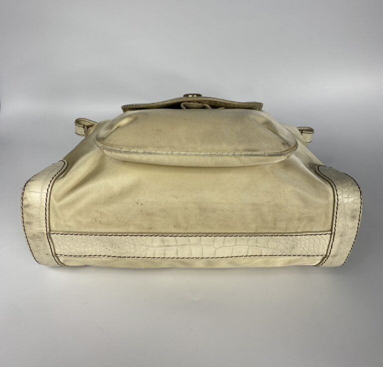 LANCEL - Sac en tissu beige et cuir crème façon reptile, porté main, double ans…