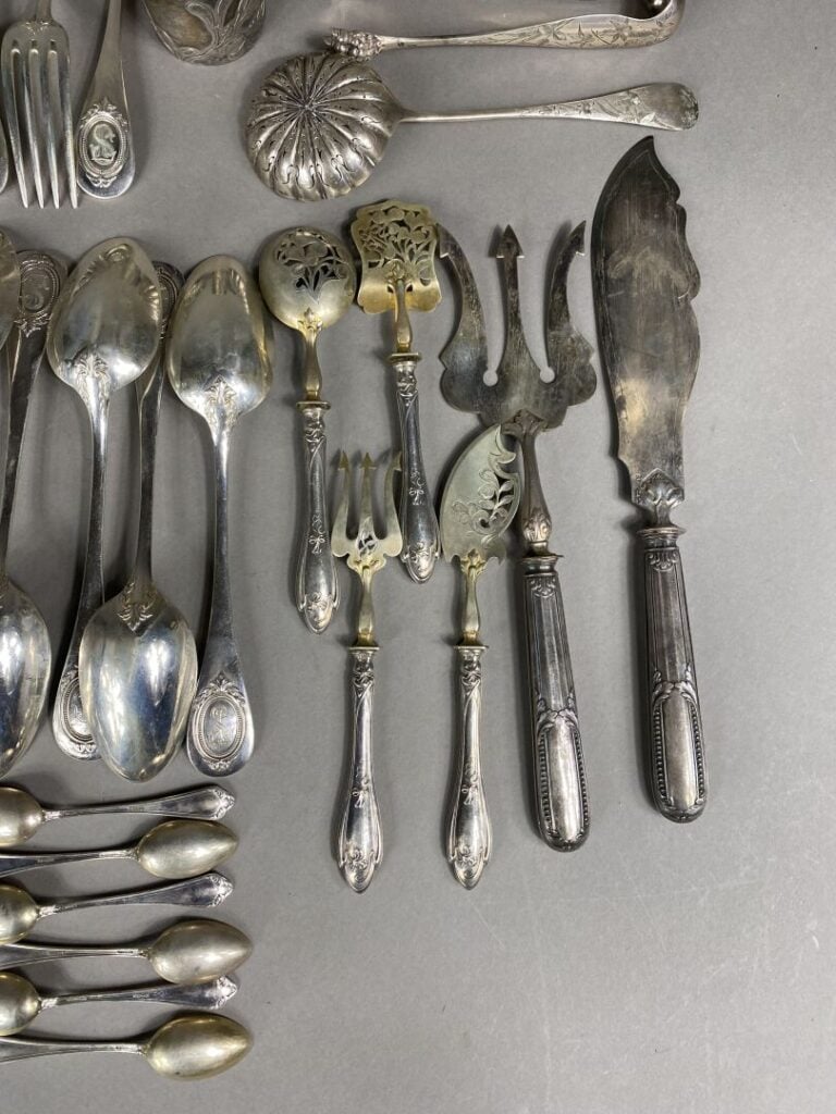 Lot de couverts et ronds de serviette en argent (925) et argent fourré comprena…