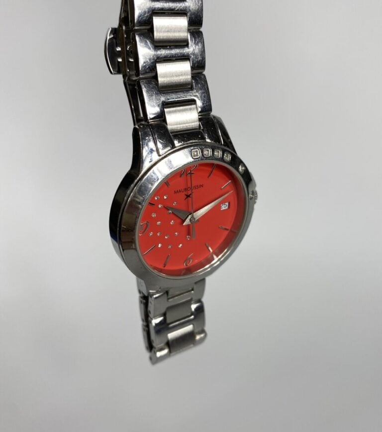 MAUBOUSSIN - Montre de dame en acier, modèle "So urgent", boîtier rond, cadran…