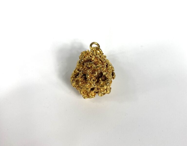 Pendentif Pépite en métal doré