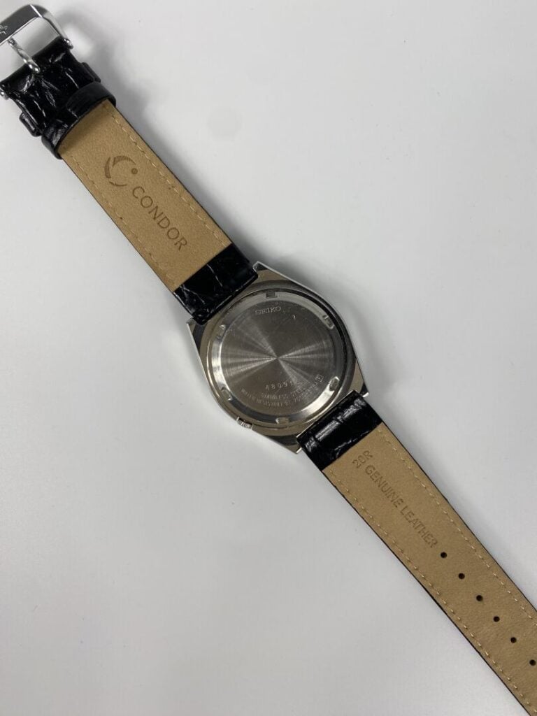 SEIKO - Montre d'homme, boîtier rond en acier, bracelet en cuir à effet d'écail…