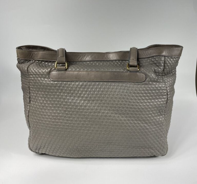 SONIA RYKIEL - Sac en cuir gris porté épaule, double anse, garniture en métal d…