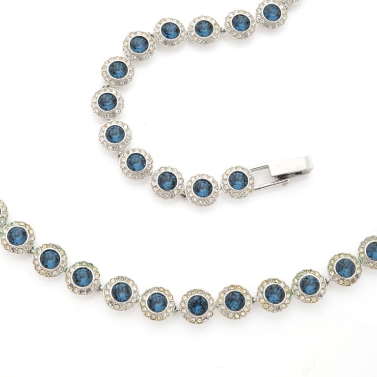 SWAROVSKI - Demi-parure comprenant un collier et un bracelet en métal argenté à…