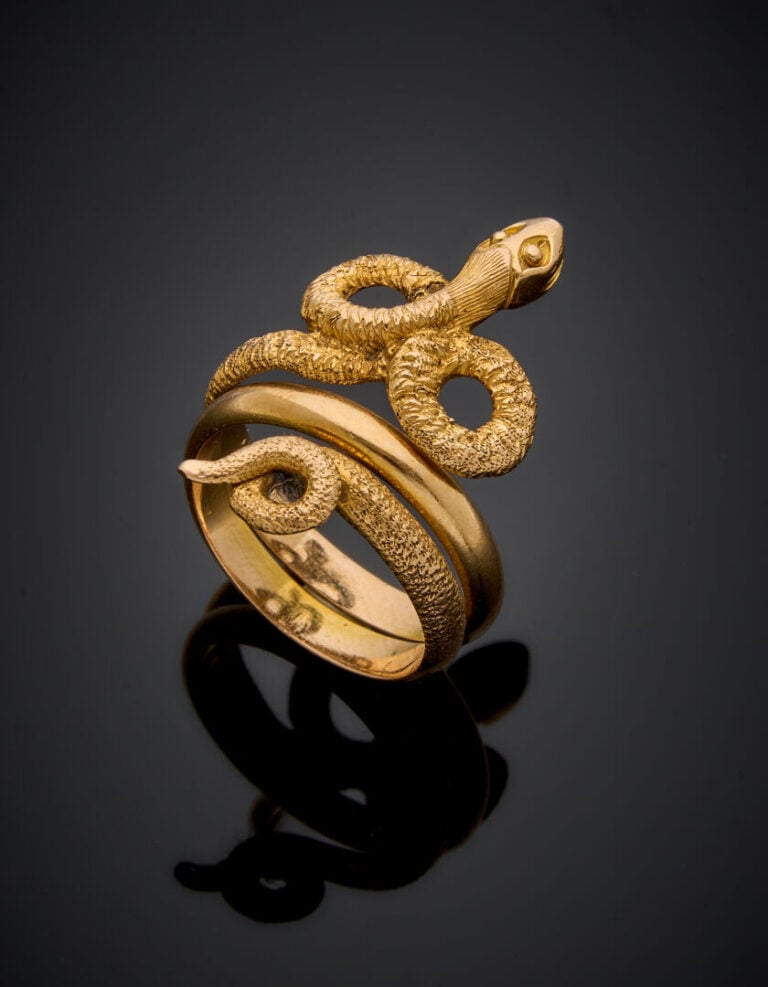 BAGUE "serpent" en or jaune (750‰) ajouré et partiellement ciselé. - Doigt : 49…
