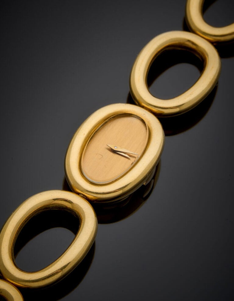 BAUME & MERCIER - - BRACELET MONTRE ovale de dame en or jaune (750‰). Cadran do…