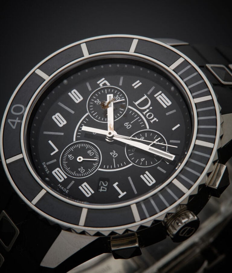 DIOR - - BRACELET MONTRE "Cristal" chronographe en acier. Lunette céramique noi…