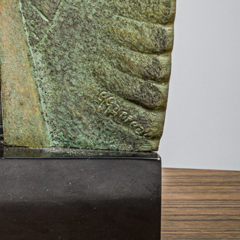 G.GARREAU (NÉ EN 1885) - Paire de serre livres en bronze à - patine verte nuanc…