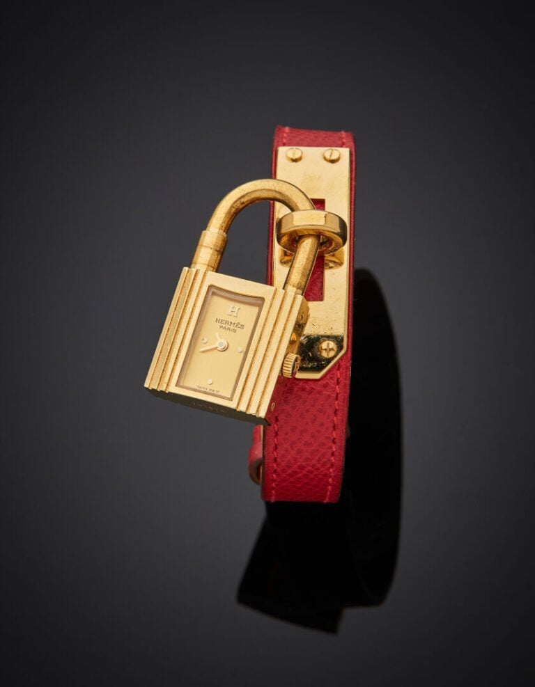 HERMES - - BRACELET MONTRE rectangulaire "cadenas", de dame, modèle "Kelly" en…