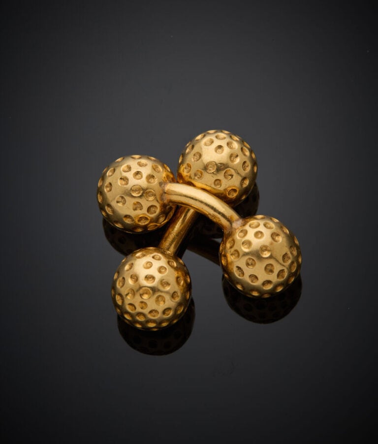 HERMES - - Paire de BOUTONS de MANCHETTES "balles de golf" en or jaune (750‰) -…