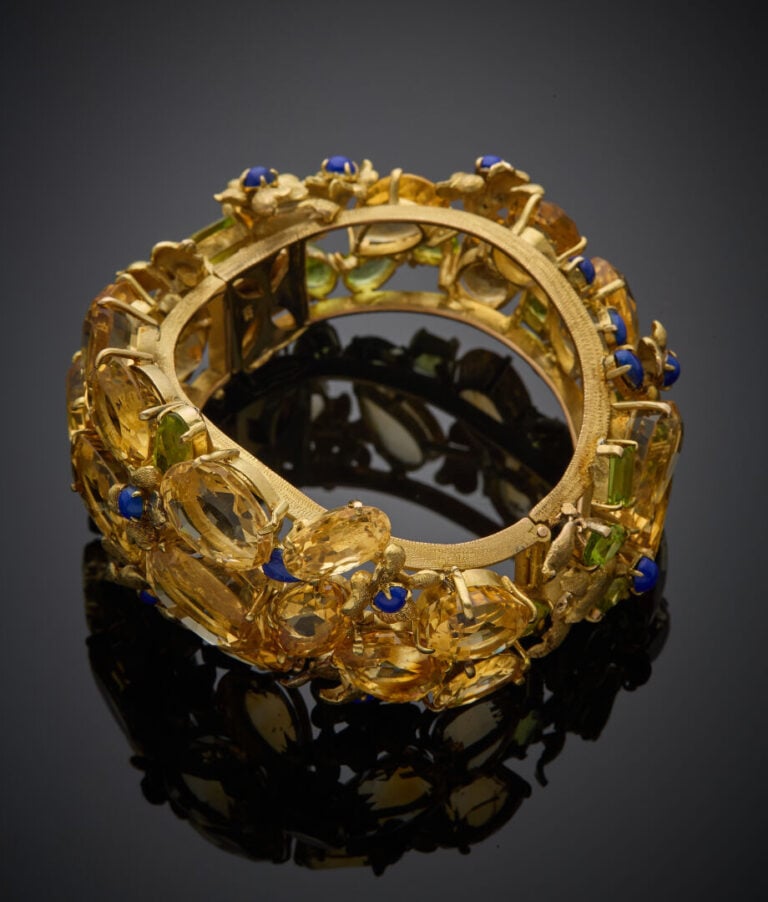Important BRACELET manchette rigide ouvrant, sinueux, en or jaune (585‰) 14 car…