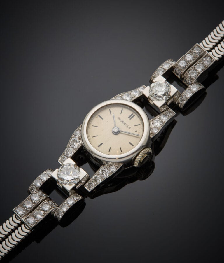MAUBOUSSIN - UNIVERSAL - - BRACELET MONTRE ronde de dame en platine (min. 800‰)…