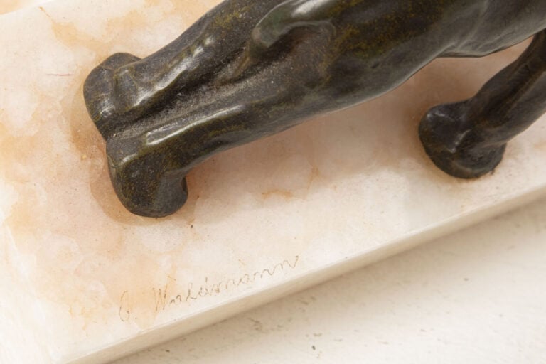 OSCAR WALDMANN (1856-1937) - Paire de serre livres en bronze à patine brune fig…