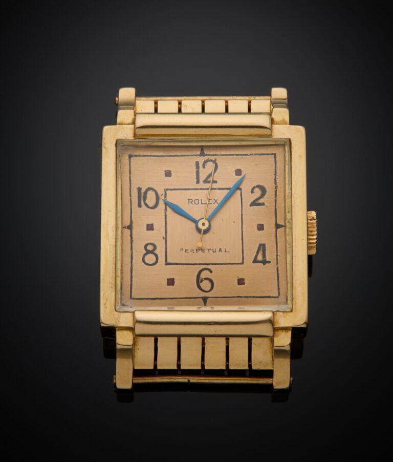 ROLEX - - MONTRE carrée en or jaune (750‰). Attaches incurvées, rainurées, et r…