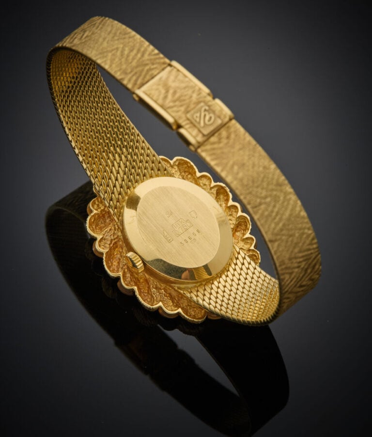 YVES SAINT BLAISE - - BRACELET MONTRE ovale de dame en or jaune (750‰) entièrem…