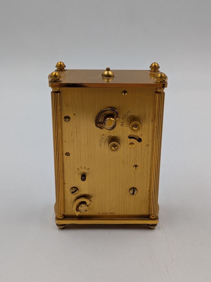 JAEGER-LECOULTRE - PENDULETTE-REVEIL de voyage dans son écrin recouvert de cuir…