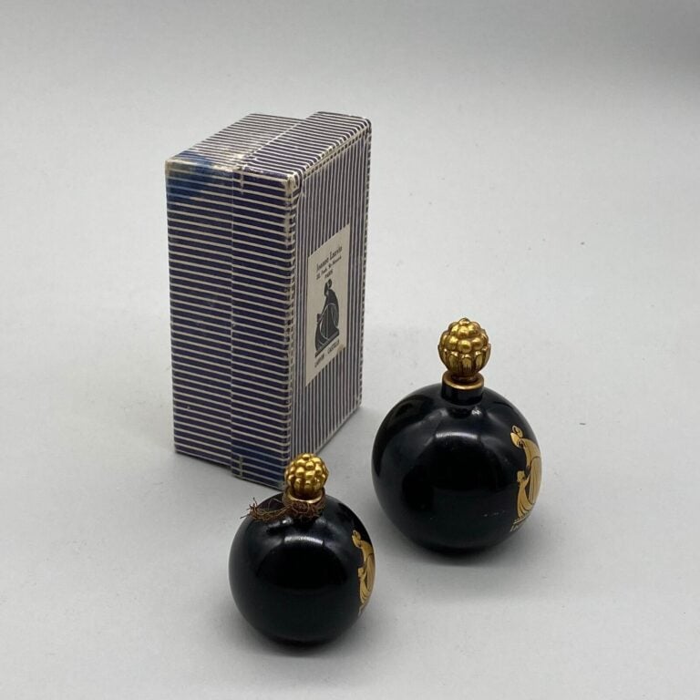 LANVIN, pour "Amorato", 2 flacons boule noire , à bouchon framboise émeri, logo…