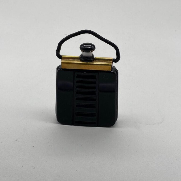 LUBIN pour "ouvrez moi", 1930, 1 flacon en Baccarat noir en forme de sac à main…