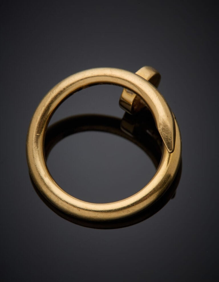 CARTIER - BAGUE modèle "Juste un clou" en or jaune (750‰). - Signée CARTIER. Da…