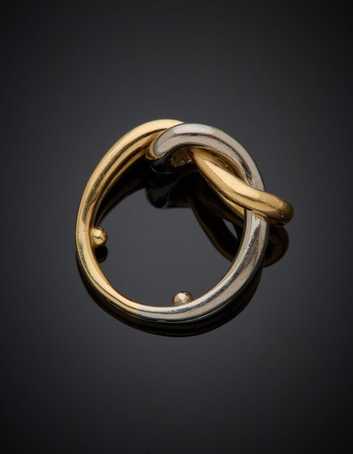 CARTIER - Importante BAGUE "nœud" en or jaune et or gris (750‰) ajouré. - Signé…