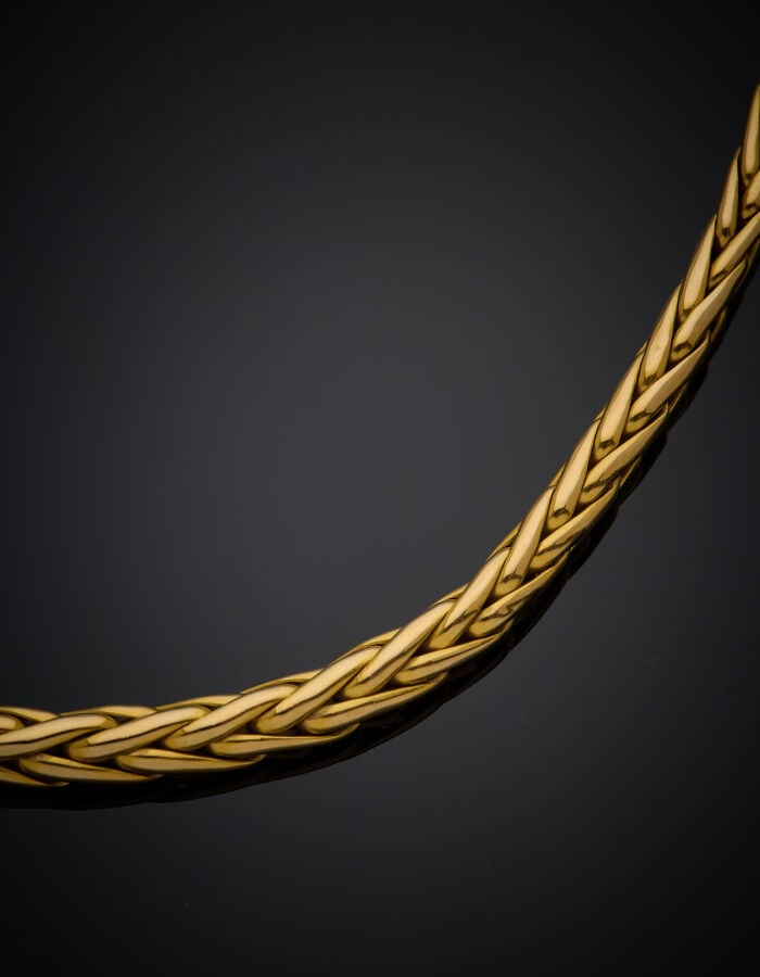 COLLIER en or jaune (750‰) à maille "palmier" en légère chute, fermoir cylindri…
