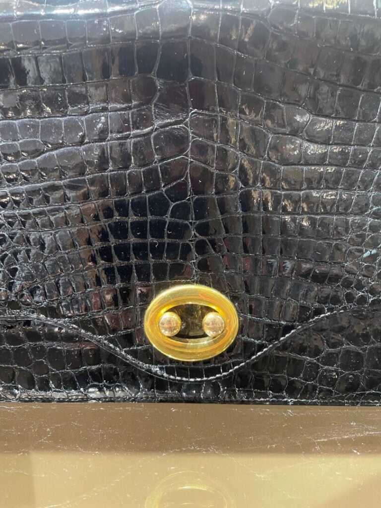 HERMES Circa 1960 - Sac "Boutonnière" en crocodile porosus noir, anse en cuir c…