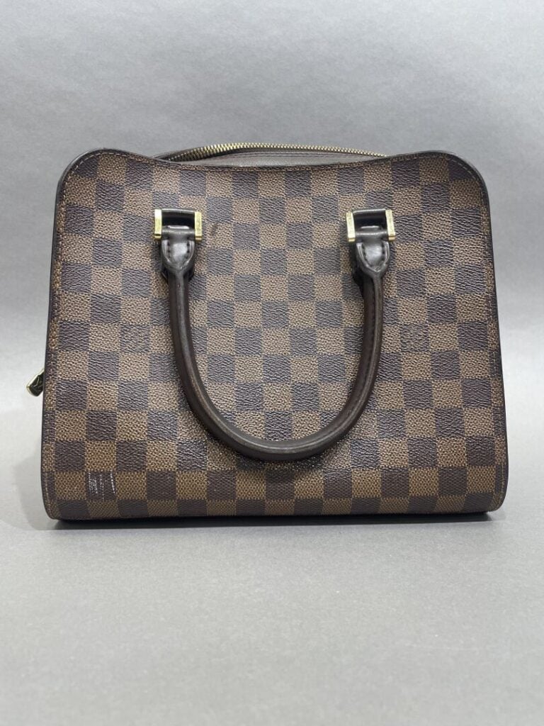 LOUIS VUITTON (1998) - Sac «Triana» en toile damier ébène et cuir taïga chocola…