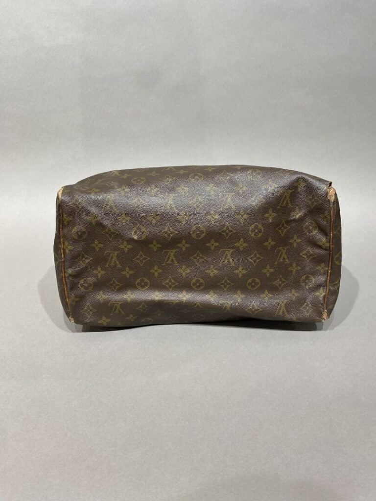 LOUIS VUITTON - Sac « speedy 35 » en toile monogram et cuir naturel, clefs, cad…