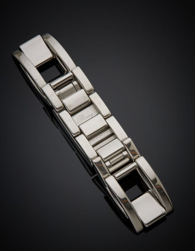 POIRAY - BRACELET MONTRE rectangulaire en acier. Cadran blanc, chiffres romains…