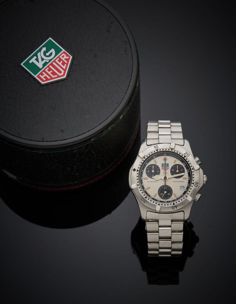 TAG HEUER - BRACELET MONTRE chronographe "Professional 200M" en acier. Lunette…