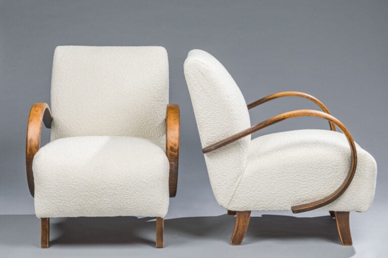 Travail des ANNEES 1950 - Paire de fauteuils bas, accotoirs à enroulement en bo… maison de vente aux encheres commissaire-priseur auction house boisgirard antonini