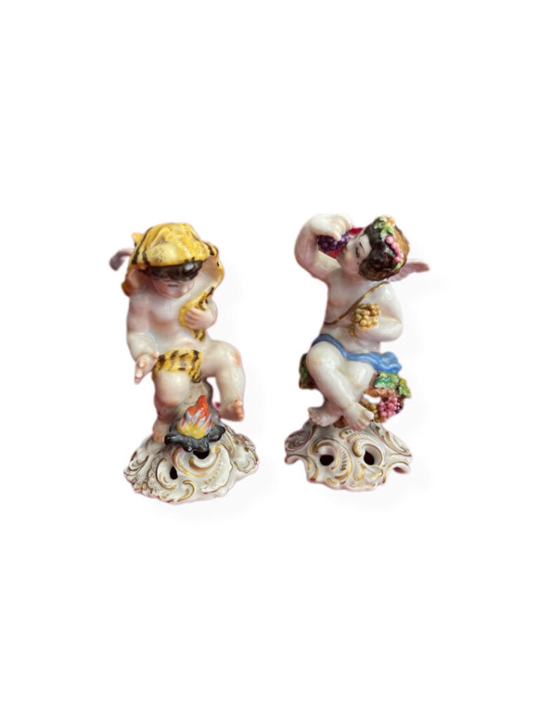 CAPODIMONTE - Deux sujets en porcelaine figurant Bacchus et Hercule enfants - H…
