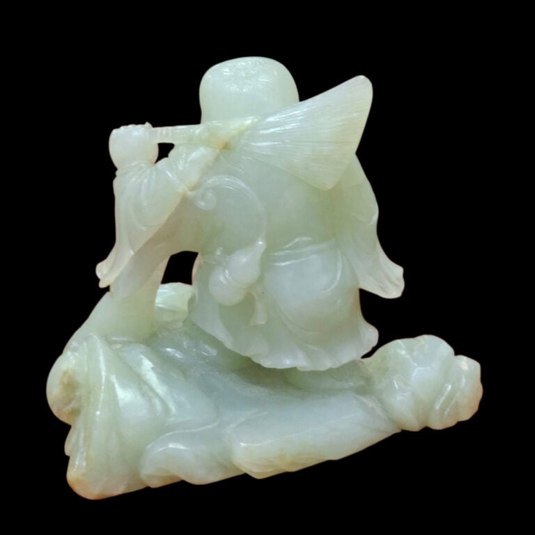 CHINE, période Qing, XIXe - Groupe en jade céladon représentant LIU HAI accompa…